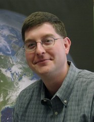 [Photo of Dr. William Slaton]
